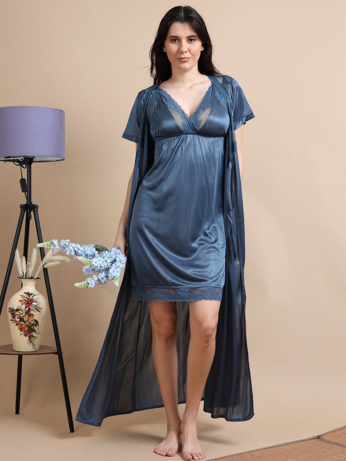 Woman wearing a satin night suit for women from Ecstasy