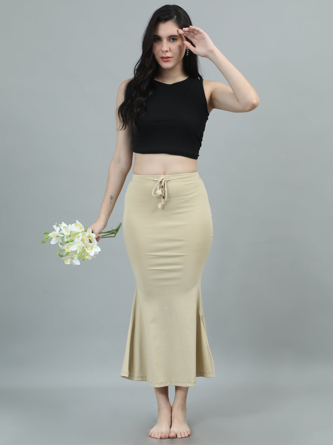 Saree shapewear care showing gentle hand washing and flat shade drying to protect the elastic